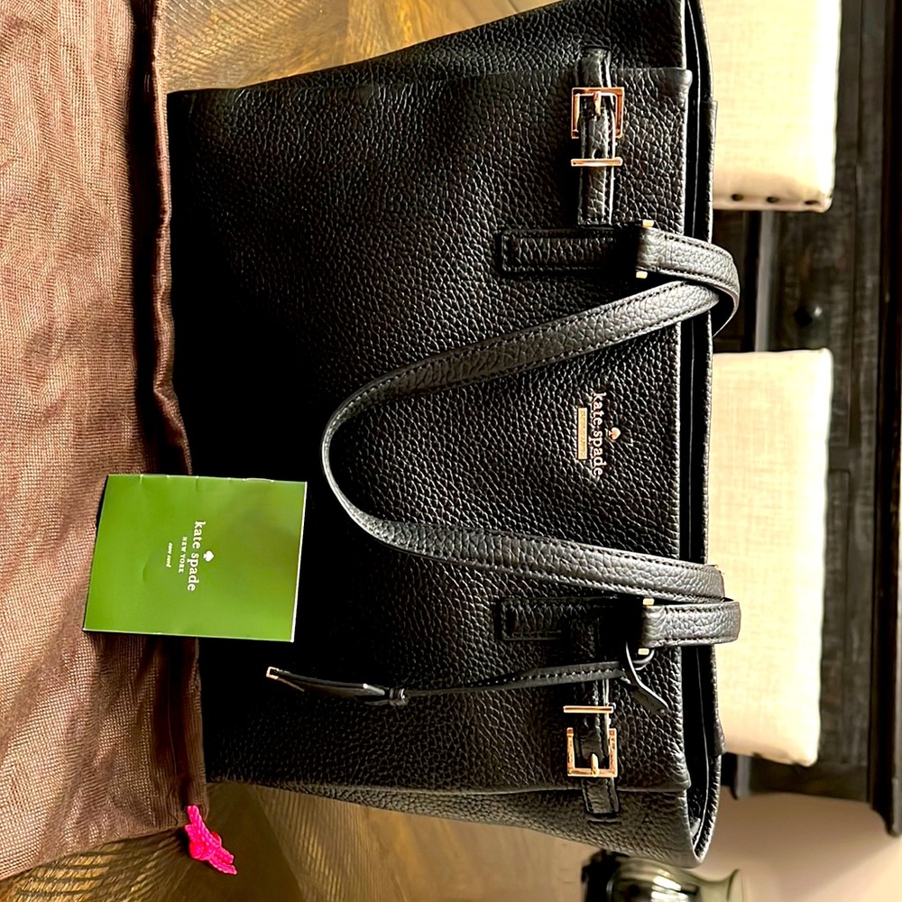 Large Kate Spade tote in black pebbled leather with gold hardware.